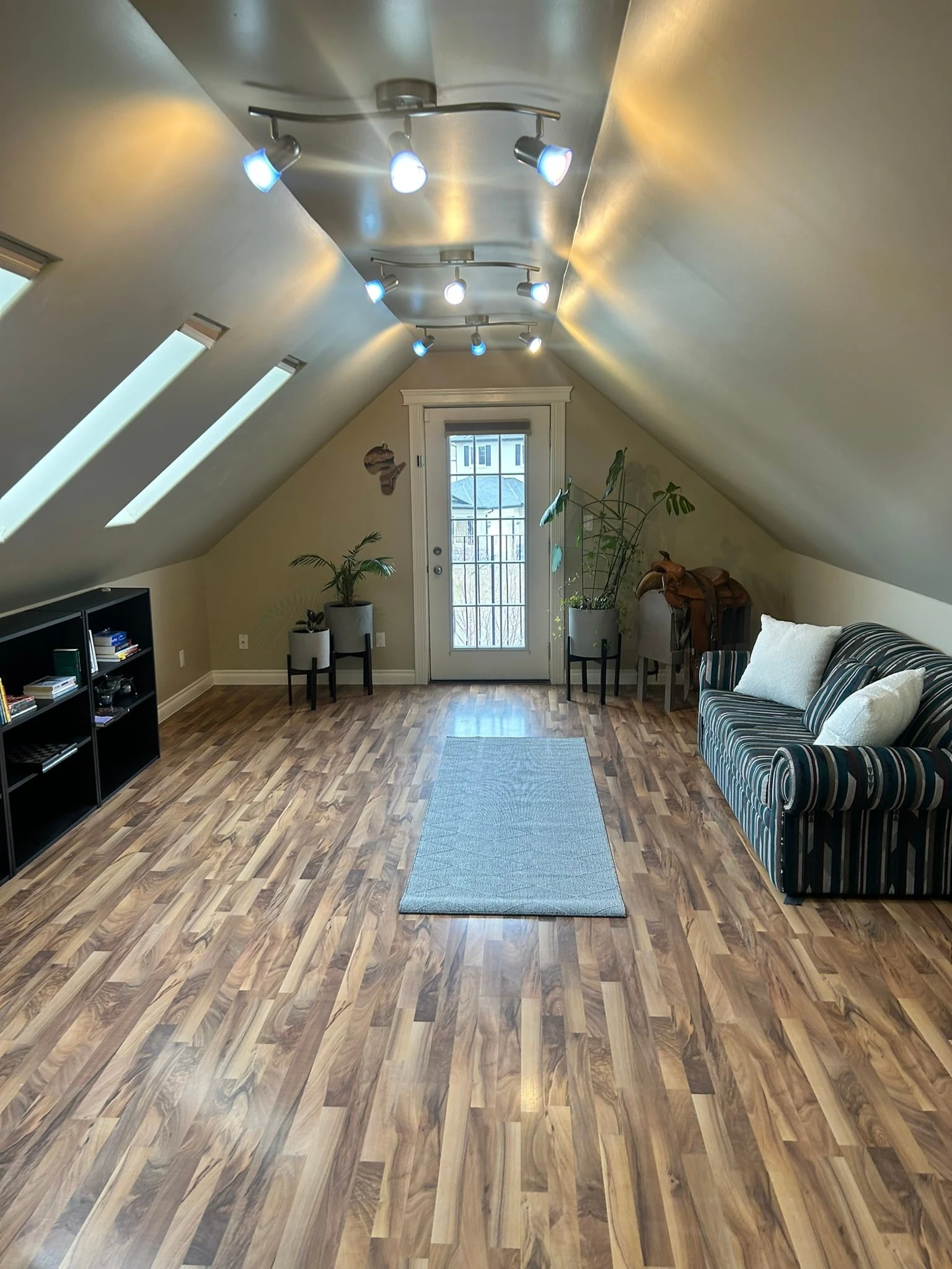Clean living space with polished wood floors